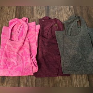 EUC, 3 pack Lulu lemon racerback swiftly tanks! Each size 6, fits like a S!